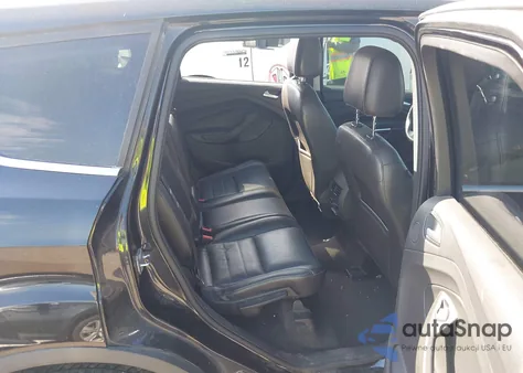 2015 Ford Escape Titanium z USA, uszkodzony, nr VIN 1FMCU0J99FUB93177